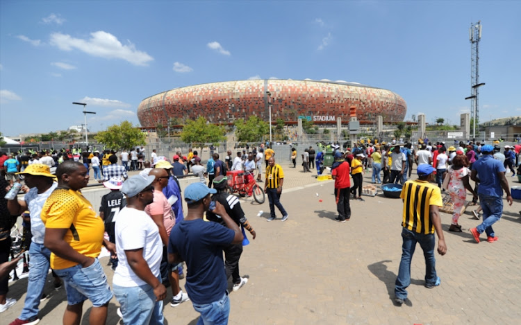 Football loving fans arriving at the stadium during the Absa Premiership match between Orlando Pirates and Kaizer Chiefs at FNB Stadium on March 03, 2018 in Johannesburg, South Africa.