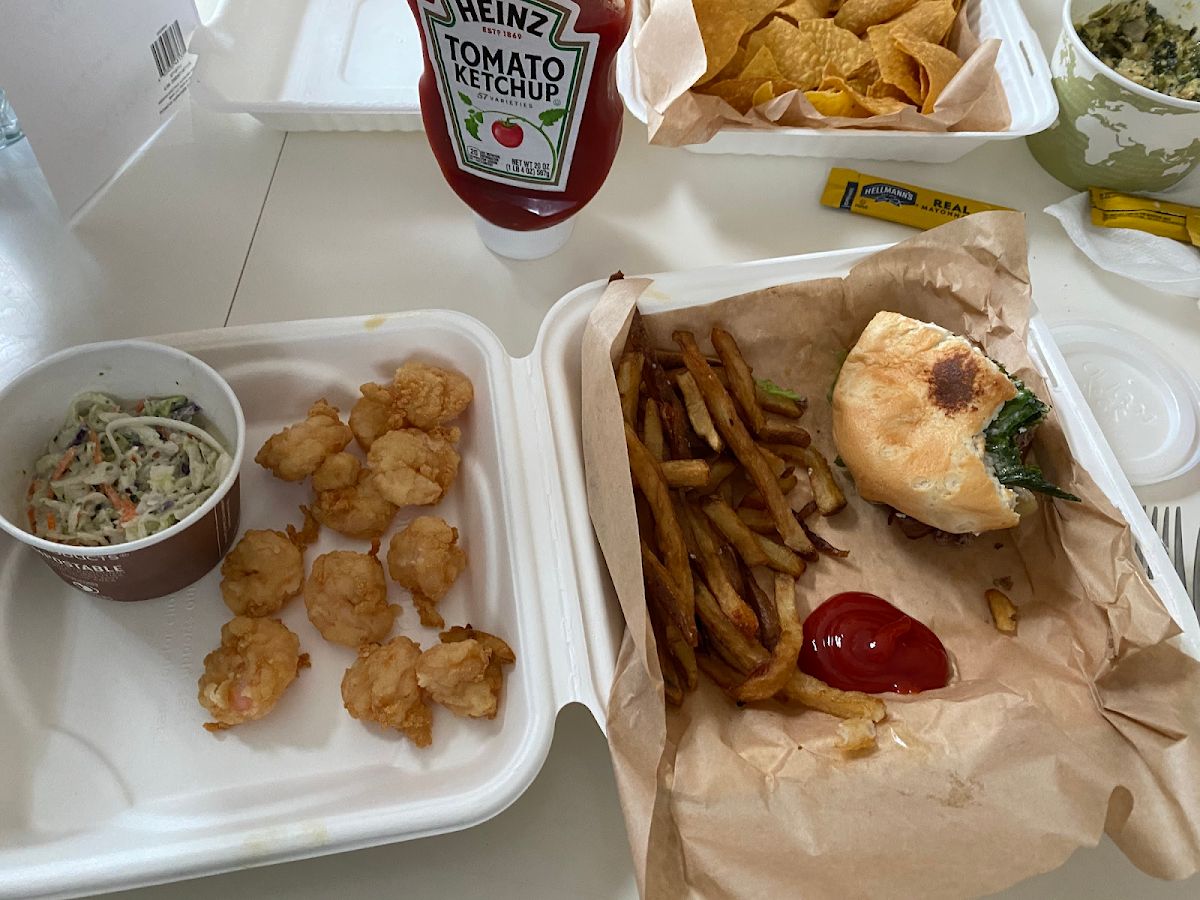 GF fried shrimp with a burger on GF bun. Fries made in dedicated fryer