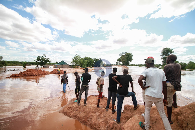 Mororo residents assess the aftermath of the flood water on April 27, 2024.