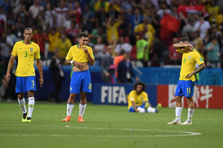 Brazil players look dejected following the 2018 FIFA World Cup Russia Quarter Final match between Brazil and Belgium at Kazan Arena on July 6, 2018 in Kazan, Russia.