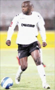 DANGER: Platium Stars midfielder Edward Williams. Pic. Duif du Toit.  19/12/2007. © Gallo Images