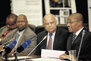 damage control:
       National House of Traditional Leaders chairman Kgosi  Pontsho Maubane, Minister Pravin Gordhan and Deputy Minister of Traditional Affairs Obed Bapela 
      
        in 
      
       Pretoria yesterday 
      PHOTO: Veli Nhlapo