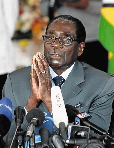 Zimbabwean President Robert Mugabe tells journalists at State House in Harare yesterday that he has learnt a new skill at the age of 89: storytelling