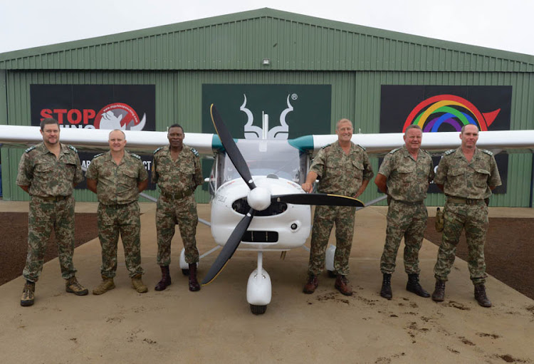The Kruger National Park's anti-poaching unit with the brand new FOXBAT A22LS aircraft - a donation from the MyPlanet Rhino Fund.