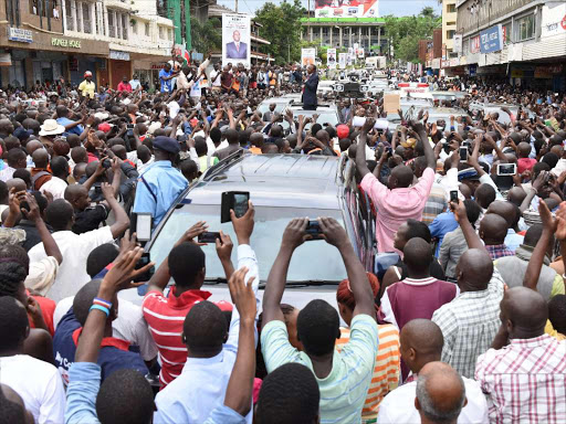 WE WANT DEVELOPMENT: President Uhuru Kenyatta in Kisumu after opening a conference last April 21.