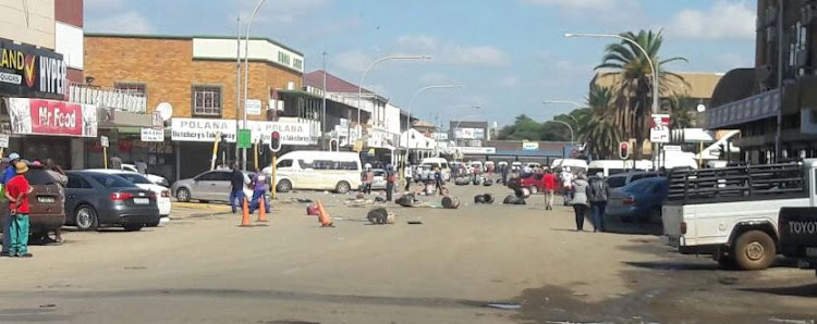 Residents have been protesting in the street of Mahikeng in a revolt against North West premier Supra Mahumapelo.