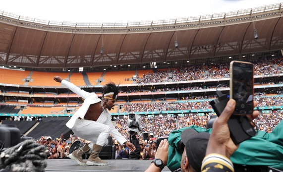 Usher turned things all the way up at FNB Stadium.