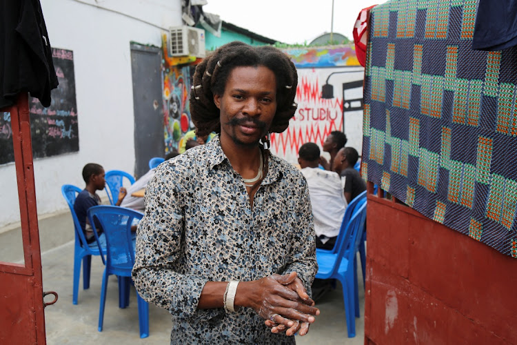 Cedrick Tshimbalanga, 32, the founder of Mokili Na Poche cultural centre, a Congolese arts refuge that helps street children, stands at the cultural centre in Kinshasa, Democratic Republic of Congo September 5, 2023.