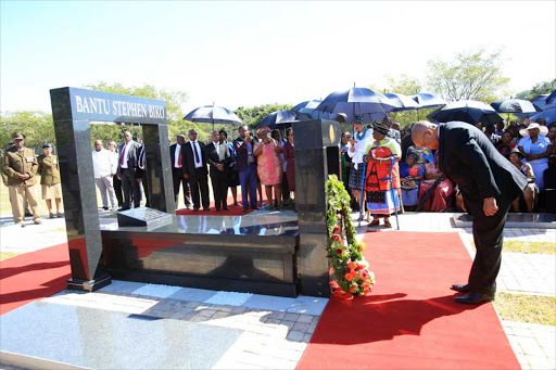 President Jacob Zuma honours fallen hero Stephen Biko at his grave in Ginsberg yesterday. The president was in King William’s Town for Human Rights Day Picture: SINO MAJANGAZA