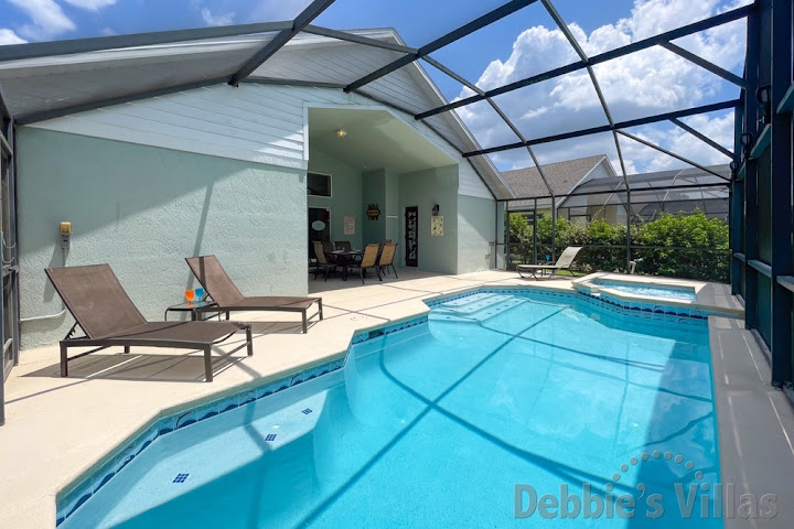 Sun-drenched pool and spa at this Kissimmee vacation villa