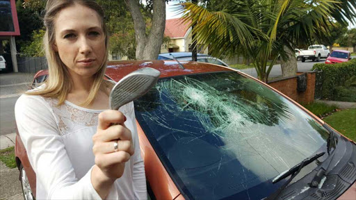 VEHICLE VANDALS: Kirstie Leigh Voogt’s Honda Jazz was damaged by vandals who set about smashing it with golf clubs while it was parked on a Stirling street in the early hours of yesterday morning Picture: SUPPLIED