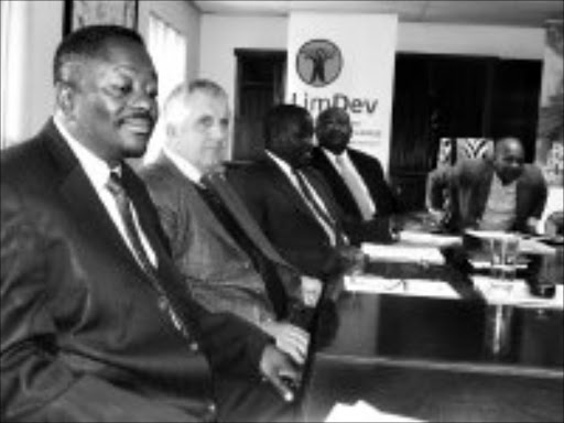 SMILES: LimDev managing director Stan Mathebatha, left with board members during a media briefing to unveil a campaign to close down the businesses of those who owed the company money. Pic. Alex Matlala. 14/04/2008. © Sowetan.