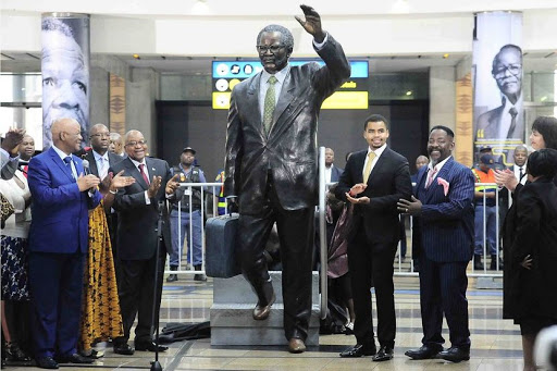 President Jacob Zuma unveiling a statue of former ANC president Oliver Tambo at the Arrivals foyer inside OR.Tambo airport. This year the ANC government is celebrating the centenary of Tambo who would have been 100 years old. Zuma was flanked Jeff Radebe, Joe Maswanganyi, Ayanda Dlodlo and Tambo's son Dali Tambo. 19/10/2017