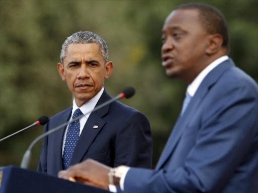 U.S. President Barack Obama (L) and Kenya's President Uhuru Kenyatta hold a joint news conference after their meeting at the State House in Nairobi July 25, 2015. /FILE