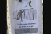 A school in France had to put up a sign asking parents not to throw their children over the fence when they are running late. 