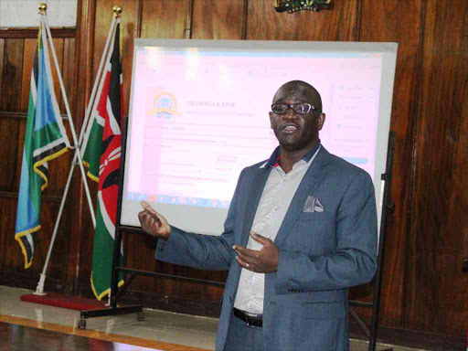 Kisumu County Communications and Planning Chief officer George Anyonga during media sensitization workshop on electronic trade licensing launched today by the county in partnership with World Bank/MAURICE ALAL