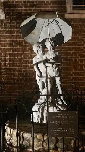 Children with Umbrella Statue