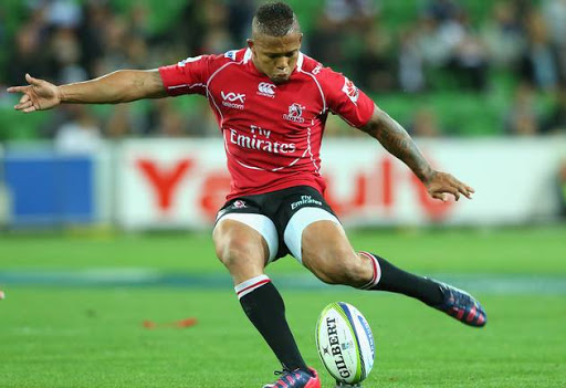 Elton Jantjies of the Lions kicks during the round six Super Rugby match between the Rebels and the Lions at AAMI Park on March 20, 2015 in Melbourne, Australia.
