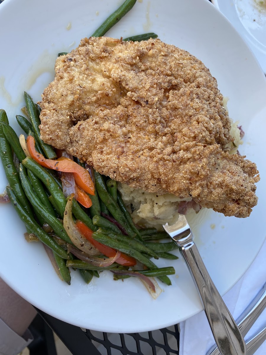 Maple pecan fried chicken with mashed potatoes and green bean medley.