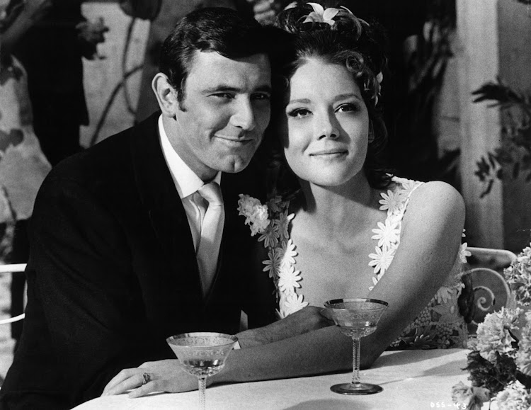 George Lazenby as James Bond and Diana Rigg as Tracy in a scene from the film 'On Her Majesty's Secret Service', 1969.