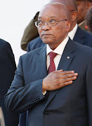 South African president Jacob Zuma stands for the National Anthem as he arrives for the State of the Nation Address on February 11, 2016 in Cape Town. Picture Credit: Mike Hutchings