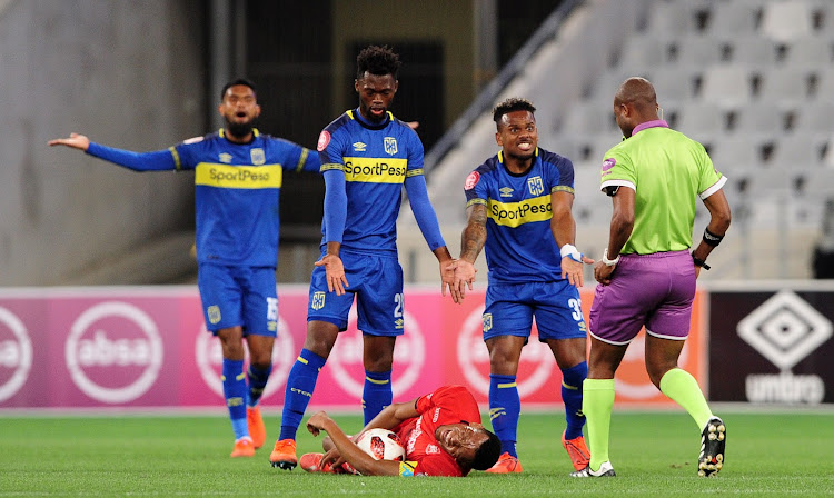 Cape Town City striker Kermit Erasmus pleads innocence after committing a serious foul on Highlands Park captain Mothobi Mvala during the Absa Premiership match at Cape Town Stadium on April 23 2019.