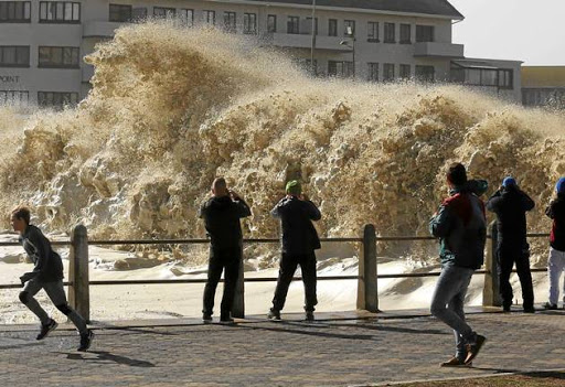 NATURE'S SHOW: Huge waves crashing over the break wall at Sea Point in Cape Town provided a spectacle.