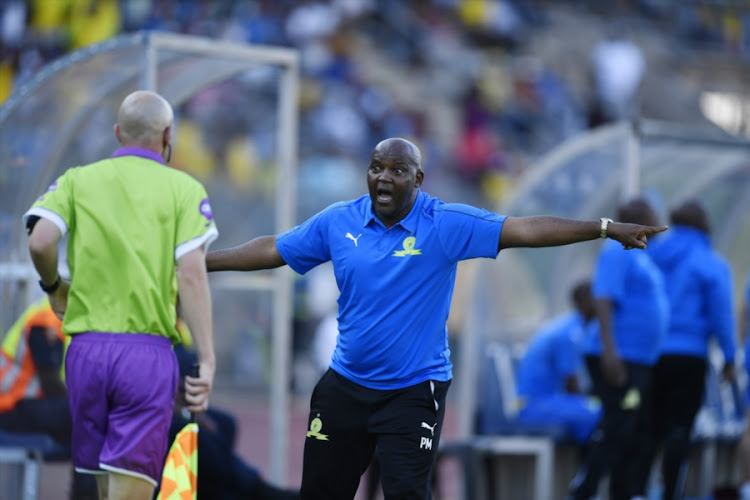 Mamelodi Sundowns' coach Pitso Mosimane remonstrates with the linesman during a 1-1 Absa Premiership draw at home to Bidvest Wits at Lucas Moripe Stadium in Atteridgeville, west of Pretoria, on October 07, 2018.