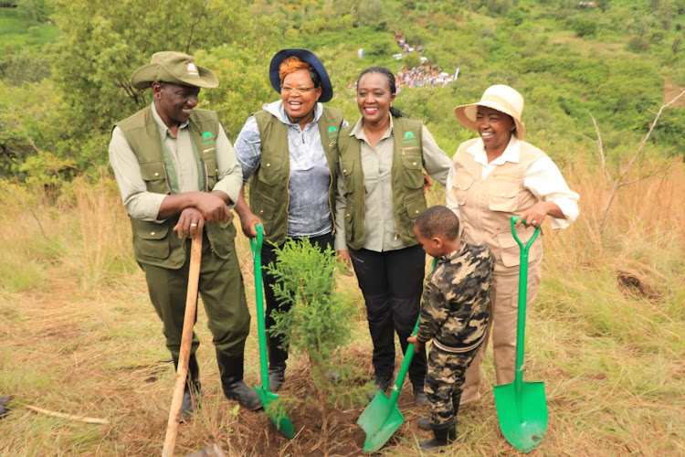 Environment Cabinet Secretary Soipan Tuya (third left) joins President William Ruto and First Lady Rachel Ruto during the tree planting exercise in Muran'ga on May 10, 2024.
