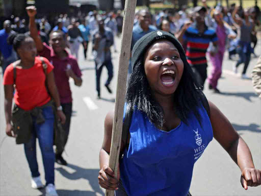 Students take part in a protest at University of the Witwatersrand as countrywide protests demanding free tertiary education entered a third week, Johannesburg, South Africa, September 20, 2016. /REUTERS