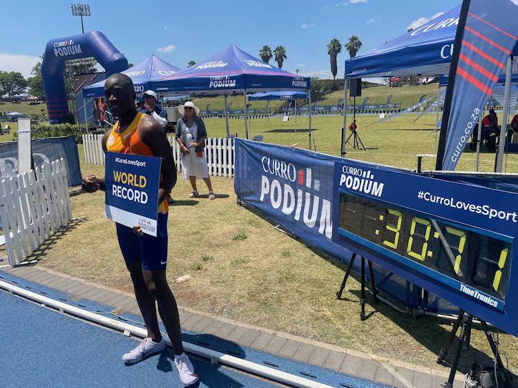 Letsile Tebogo poses after breaking the 300m world best in Pretoria on Saturday.