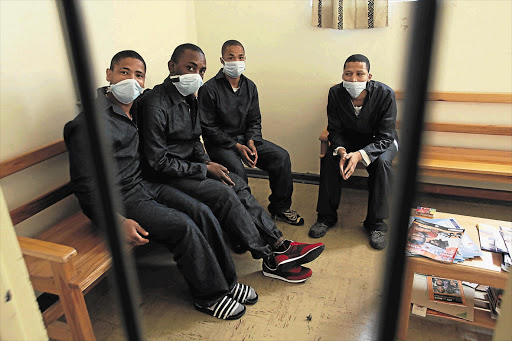 Awaiting-trial prisoners wait for the results of their tests for TB at Pollsmoor prison in the Western Cape yesterday