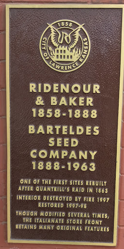 RIDENOUR & BAKER 1858–1888 BARTELDES SEED COMPANY 1888–1963 ONE OF THE FIRST SITES REBUILT AFTER QUANTRILL'S RAID IN 1863 INTERIOR DESTROYED BY FIRE 1997 RESTORED 1997–98 THOUGH MODIFIED SEVERAL...