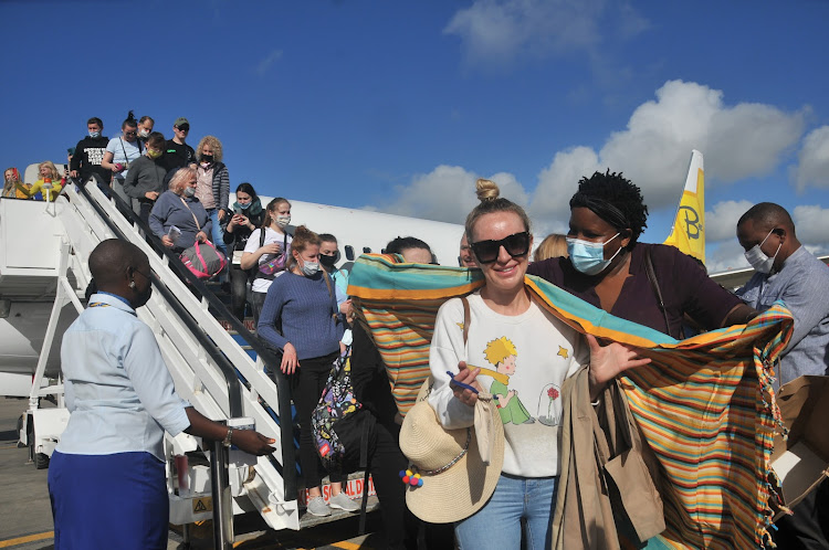 Mombasa County officials from the Tourism Department receive second group of 180 tourists from Ukraine who jetted in at Moi International Airport on Monday