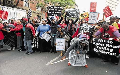 Young and old took part in protests organised by Cosatu against the e-tolling on Gauteng's highways. File photo.