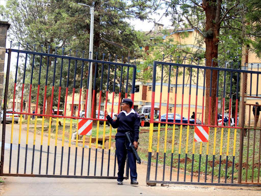 A policewoman guards Gigiri police station where Migori governor Okoth Obado is being held after arrest over Sharon's murder, September 23, 2018. /EZEKIEL AMING'A