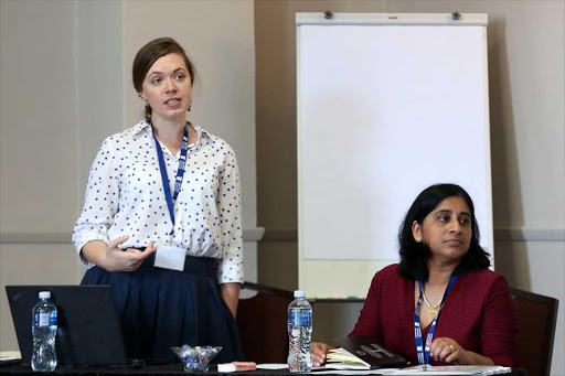 ON POINT: Shanna Nienaber, water RDI Roadmap manager, making a presentation during the one day water security conference at King David Hotel yesterday. Listening on is Manjusha Sunil, manager of water technologies programme at Water Research Council Picture: SIBONGILE NGALWA