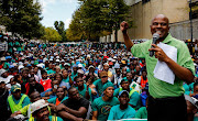 FILE PICTURE: March 27, 2014. AMCU president  Joseph   Mathunjwa  addressing AMCU member outside the Impala Platinum's offices on Fricker Road in Illovo to hand over a memorandum. AMCU strike started two months ago, demanding a R12 500 basic monthly salary while Anglo American, Lonmin and Impala platinum mines are offering 7.5%. Pic: Moeletsi Mabe. © The Times