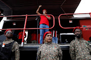 EFF leader Julius Malema addresses party supporters gathered outside the Zondo commission of inquiry into state capture in Parktown, Johannesburg. It was here that he singled Ranjeni Munusamy out for criticism.