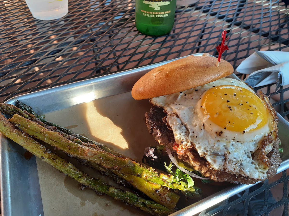 House burger on GF bun with grilled asparagus