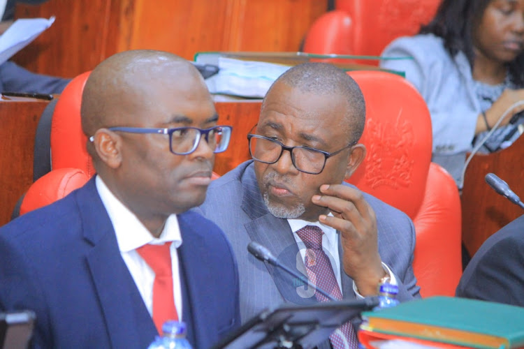 Agriculture Cabinet Secretary Mithika Linturi follows proceedings as the National Assembly select committee holds impeachment pre-trial session at County Hall on May 7, 2024.