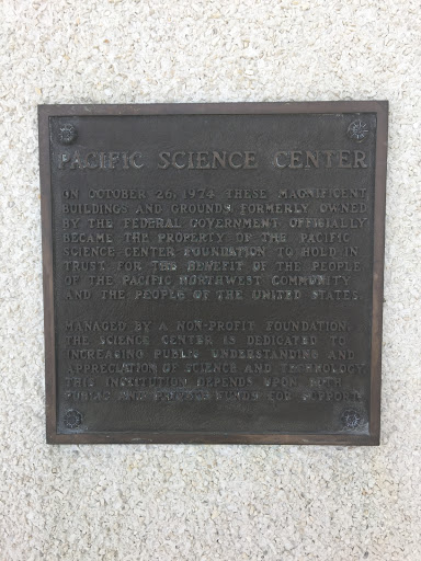 This plaque is on the outside of the PACCAR IMAX theatre and it memorizes the transfer of ownership of the Pacific Science Center grounds, following the 1962 World's Fair. It reads: "PACIFIC...