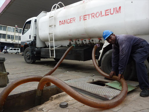 A fuel tanker offloads petrol at a petrol station.Photo Elkana Jacob