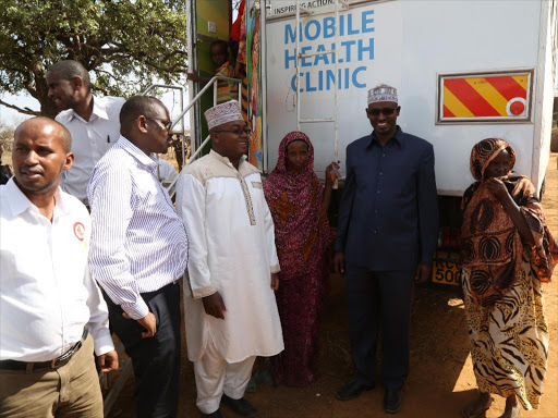 Results: Health PS Nicholas Muraguri (third left) and Governor Abdullahi join residents at Watiti Village in Wajir North.