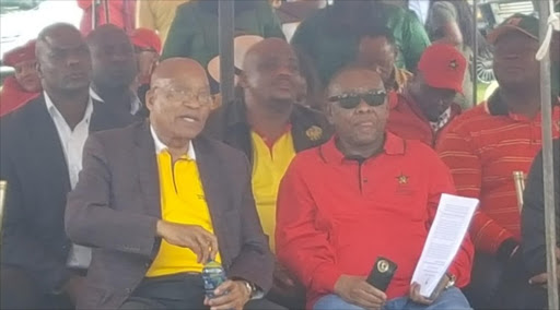 Pres Zuma and SACP GS Blade Nzimande sit together as crowd continues to disrupt. PICTURE: Kyle Cowan #MayDay2017