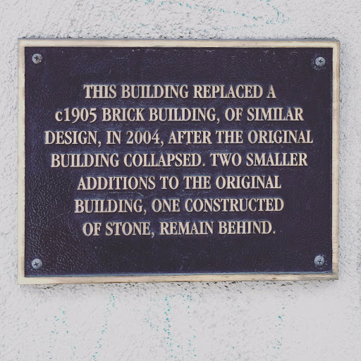 THIS BUILDING REPLACED A c1905 BRICK BUILDING, OF SIMILAR DESIGN, IN 2004, AFTER THE ORIGINAL BUILDING COLLAPSED. TWO SMALLER ADDITIONS TO THE ORIGINAL BUILDING, ONE CONSTRUCTED OF STONE, REMAIN...