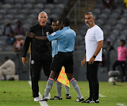 Cape Town Spurs coach Ernst Middendorp argues with a referee during their DStv Premiership match against Orlando Pirates at Orlando Stadium.