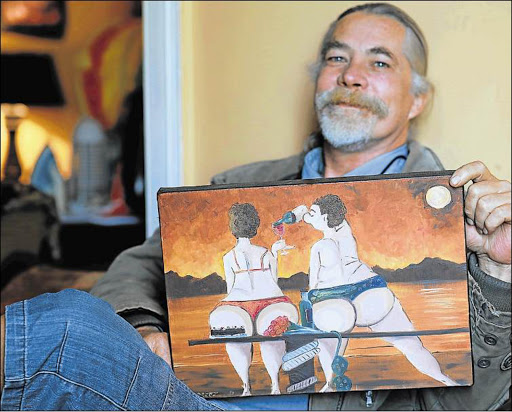 SUNSET: Cambridge resident Christopher Joynt with the L du Preez painting titled ‘Elaine and Leonie’ Picture: MARK ANDREWS