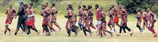 EC Bees assistant coach Mokete Tsotetsi takes players through their paces as the Bhisho team prepares to play against Orlando Pirates in the Nedbank Cup last 32 game at .