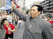 HAUNTING: Chen Yan, a 57-year-old female impersonator of China's late chairman Mao Tse-tung, in Mianyang